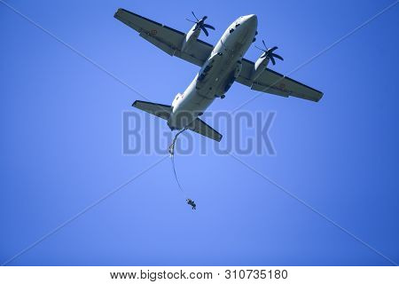 Boboc, Romania - May 22, 2019: Military Paratroopers Jump From An Alenia C-27j Spartan Military Carg