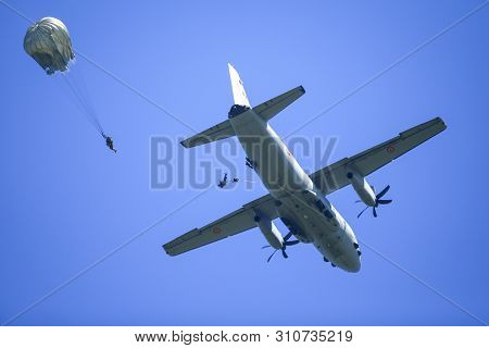 Boboc, Romania - May 22, 2019: Military Paratroopers Jump From An Alenia C-27j Spartan Military Carg