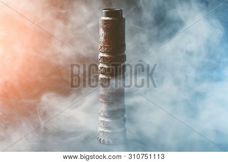 Vape Device In Vapor Smoke Clouds, Stylish Mechmod With Rda Atomizer For Vaping In Red And Blue Ligh