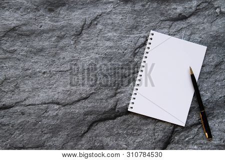 Blank Spiral Bound Notebook And Pen. Copy Space