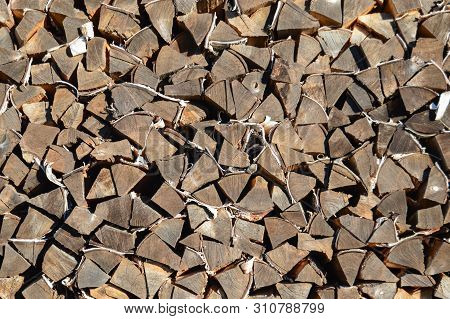 Big Wood Stack Of Wood. Woodpile. Firewood. Background. Close-up