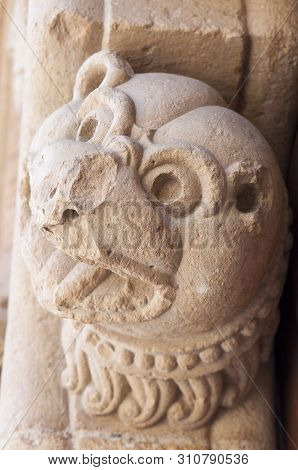 Basilica Of San Isidoro, Leon, Spain. Decorated Rabbet With Dog Head At Door Of Forgiveness