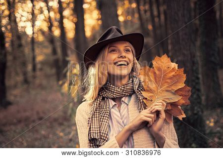 Autumn Woman. Carefree Young Woman In Trendy Vintage Pullover Or Sweater. Surprise Autumn Woman. Rom