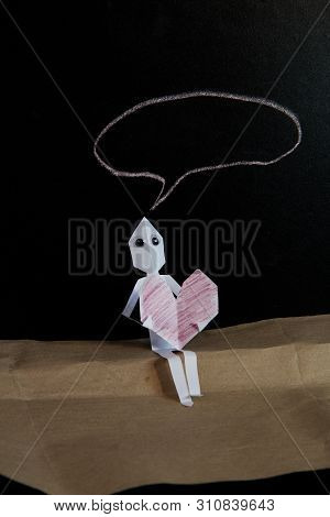 The Paper Man In Love Is Thinking Of Something Important