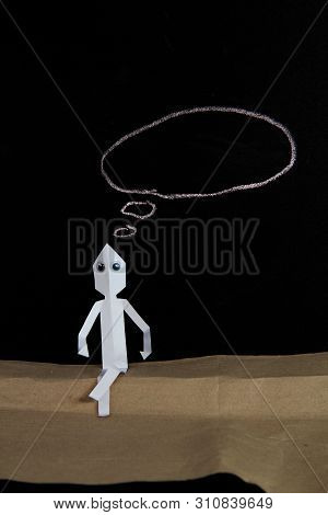 The Paper Man Is Thinking Of Something Important
