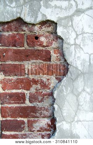 Old Crumbling Wall Of Cement And Brick
