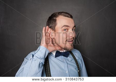 Handsome Funny Man Overhear On Blackboard