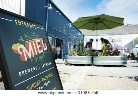 New Orleans,la/usa -03-23-2019: The Courtyard Of Miel Brewery And Taproom In New Orleans, A Craft Br
