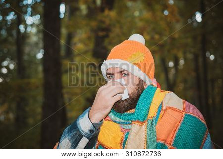 Man Work Out After He Sick Blowing Nose And Sneezing, Coughing. Infected Man Blowing His Nose In Tis