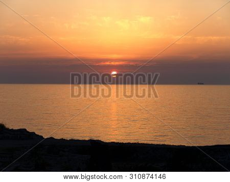 Sevastopol, Crimea - July 19, 2008: The Peninsula Of Crimea And Black Sea. Scarlet Sunset With Ships