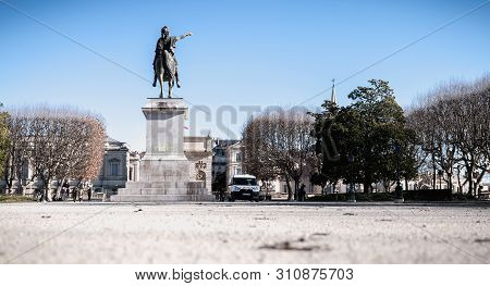 City Employee Who Cleans The Statue Of Louis Xiv In Montpellier, France
