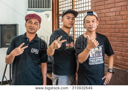 Puerto Princesa, Palawan, Philippines - March 3, 2019: Iwahig Penal Colony. Three Immates Flash Posi