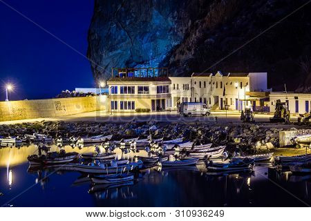 El Jebha, Morocco - October 18, 2013. Marina With Colored Boats By Mediterranean Sea At Night