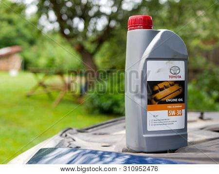 Miercurea Ciuc, Romania- 12 July 2019: Toyota 5w 30 Engine Oil On Opened Engine Hood.