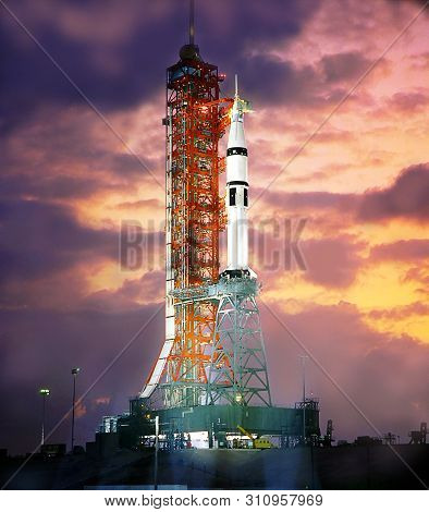 Spaceship At The Launch Site In The Spaceport. Silhouette Of Space Shuttle At Dusk. Amazing Landscap