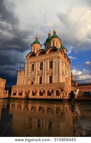 Astrakhan. Cathedral Of The Assumption Of The Blessed Virgin Mary. Golden Domes On A Background Of T