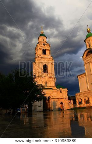 Astrakhan. Cathedral Of The Assumption Of The Blessed Virgin Mary. Golden Domes On A Background Of T