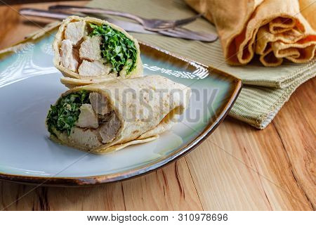 Chicken Caesar Salad Wrap Sandwich With Kale And Parmesan Cheese