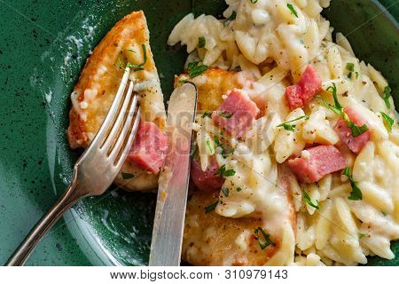 Chicken Cordon Bleu Served With Creamy Orzo Risotto And Ham