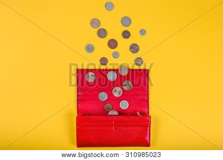 Open Female Red Leather Wallet With Different Coins On Yellow Background With Copy Space, Overhead V