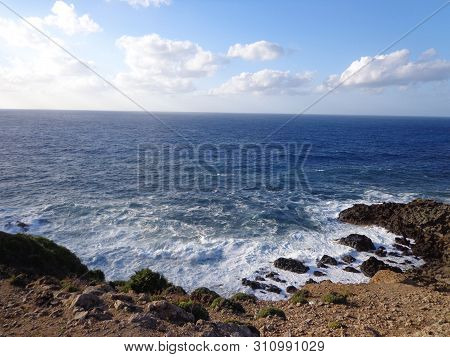 A Rocky Beach Struggling With Angry Waves