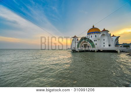 Kuala Lumpur, Malaysia - June 24, 2019: Beautiful Sunset Over The Malacca Straits Mosque Or Masjid S