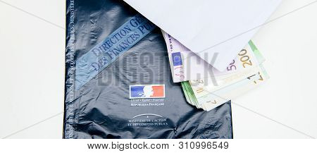 Paris, France - Mar 5 2019: Blue Envelope Of Declaration Des Revenus Income Statement Instruction Wi
