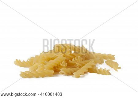 Small Slide Fusilli, Fusillini Lying On White. Italian Pasta.