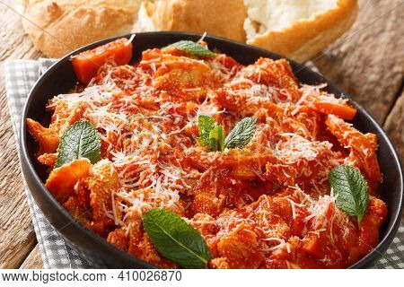 Italian Roman Tripe Trippa Alla Romana Closeup In The Plate On The Table. Horizontal