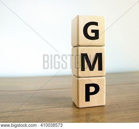 Gmp Symbol. Concept Words 'gmp, Good Manufacturing Practice' On Cubes On A Beautiful White Backgroun