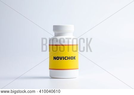 Poison Bottle Newbie On A Dark Background. Poison Newbie Chemical Weapons Concept.