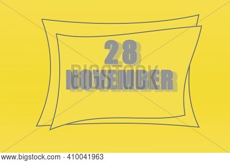 Calendar Date In A Frame On A Refreshing Yellow Background In Absolutely Gray Color. November 28 Is 