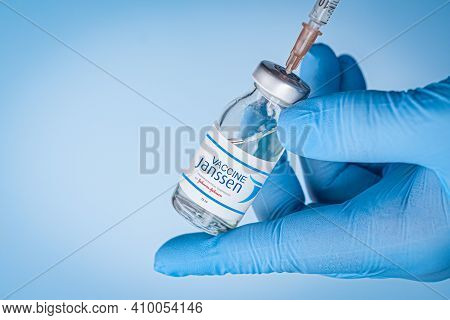 Izmir, Turkey - January 17 2021: Coronavirus Vaccine Concept And Background. Doctor Is Holding Janss