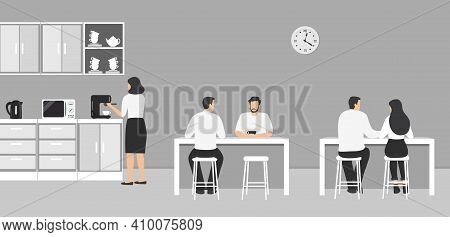 Office Kitchen. Dining Room In The Office. Employees Are Sitting At The Table. Coffee Break. There A