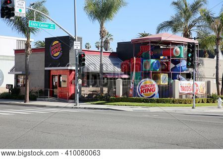 Santa Ana, California - USA - February 25, 2021: Burger King Fast Food Restaurant with children's play ground outside. Fast Food is enjoyed by hungry people world wide on a daily basis. Editorial Use.