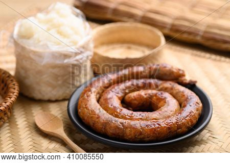 Northern Thai Sausage (sai Aua), Grilled Intestine Stuffed With Minced Pork, Spices And Herbs Eating