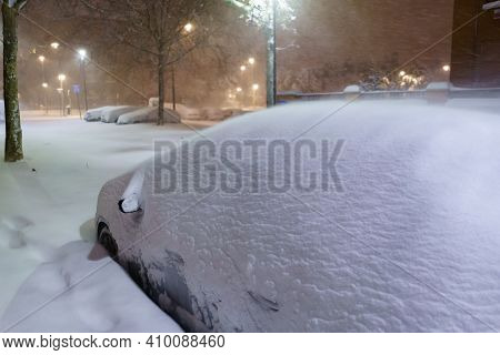 Cars And Streets Covered In Snow In Night Image Of Filomena Storm Fall In Madrid Spain. Europe