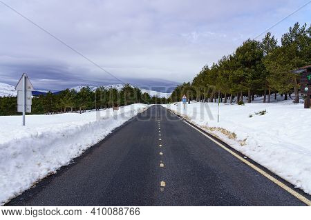 High Mountain Road With Clouds And Blue Sky. Morcuera Madrid.