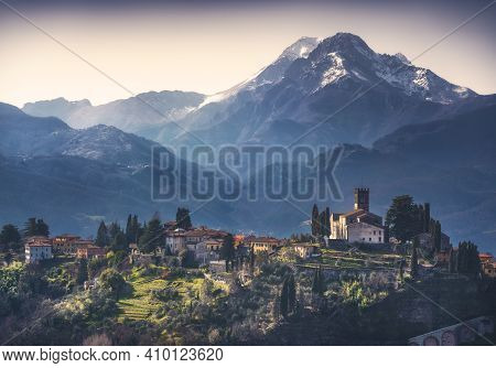 Barga Town And Alpi Apuane Mountains In Winter. Garfagnana, Tuscany, Italy Europe