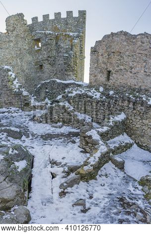 Snow-covered Montanchez Fortress. Roman Origin Castle, Rebuilt By Almohads And Used By Order De Sant