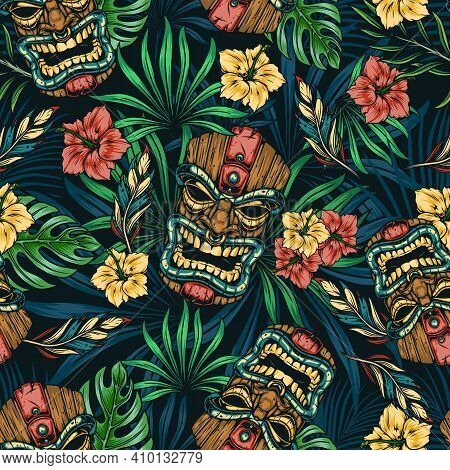 Hawaiian Tropical Colorful Seamless Pattern With Tribal Tiki Mask Hibiscus Flowers Monstera And Palm