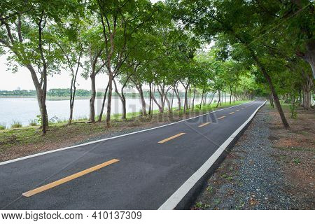 Empthy Running Lanes Of Road In Park