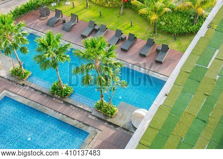 Swimming Pool Out Door With Green Grass Field