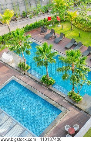 Swimming Pool Out Door With Green Grass Field