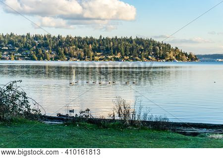 Clouds Hover Over Mercer Island On Lwke Washington In Washington State.