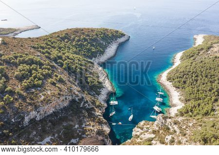 Aerial Drone Shot Of Yachts In Adriatic Sea Cove Stiniva On Vis Island In Croatia Summer Morning