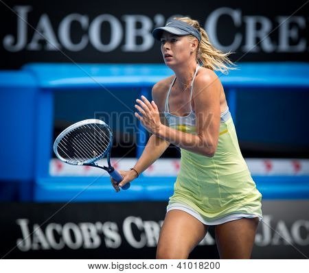 MELBOURNE - 14. ledna: Maria Sharapova Ruska v jejím prvním kole vyhrát nad Olga Puchkova nebo Russi