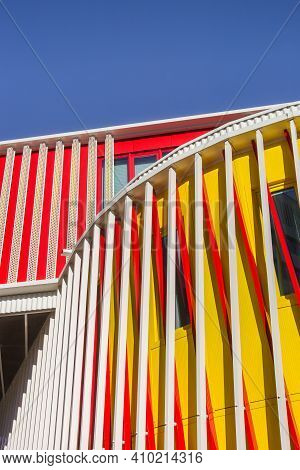 Groningen, Netherlands - February 13, 2021: Bright Colors Of Modern Architecture Against A Blue Sky 