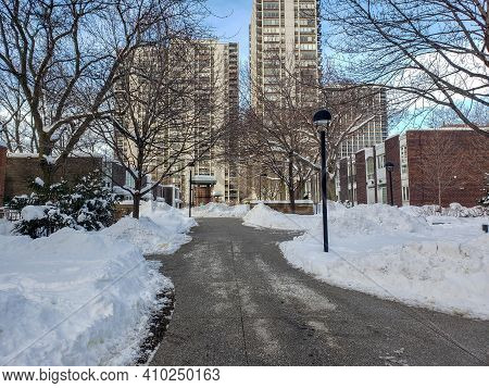 Snow Plowed Sidewalk At The Sandburg Village Community In Winter