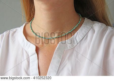 Turquoise Necklace. A Short Necklace On A Girl Made Of Natural Turquoise Stones. Handmade Jewelry Ma
